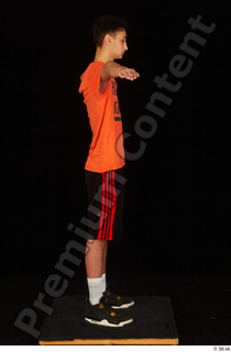 Danior black shorts black sneakers dressed orange t shirt shoes…